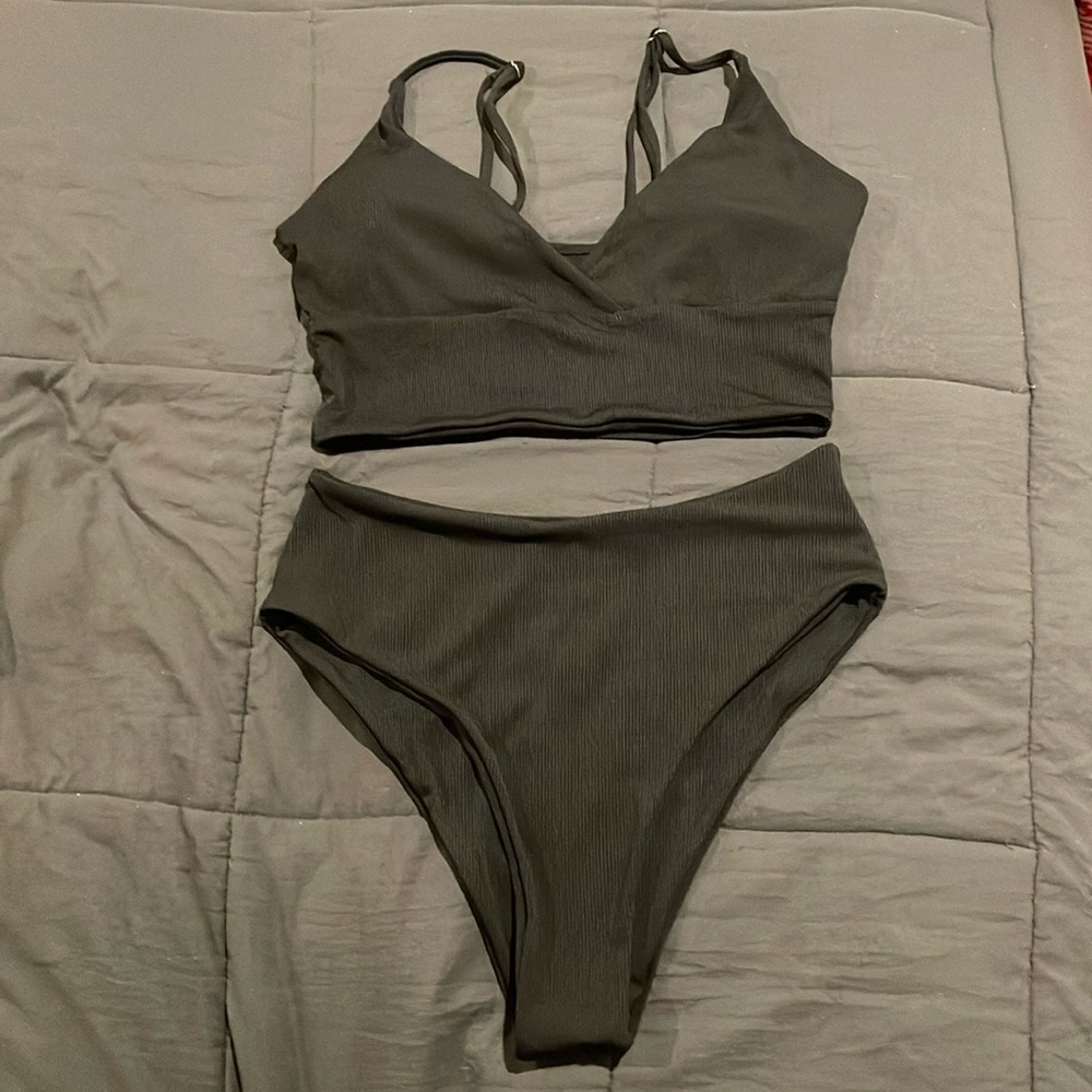 Woman’s black tankini